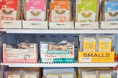 Three rows of Identity cat food available at Tilley's Pet Supplies, a natural cat food store in Washington DC and Middleburg VA.